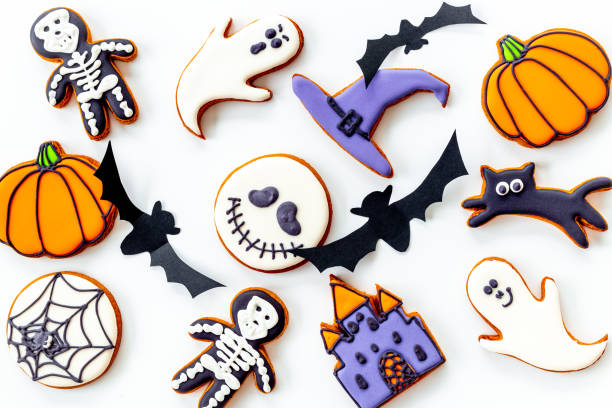 istock Halloween party background flat lay with gingerbread cookies 1342985647