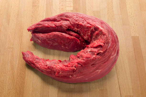 Raw Tenderloin  on wooden table background