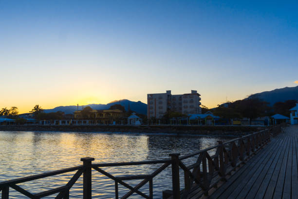 la ceiba, honduras sunday in the morning, tourist pier, sunrise in the beach, blue color, tourism background,paradise, loneliness, without people, isolated - tegucigalpa imagens e fotografias de stock