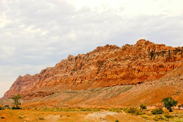 istock Jagged Mountain Overlooking Desert Valley 1342987036