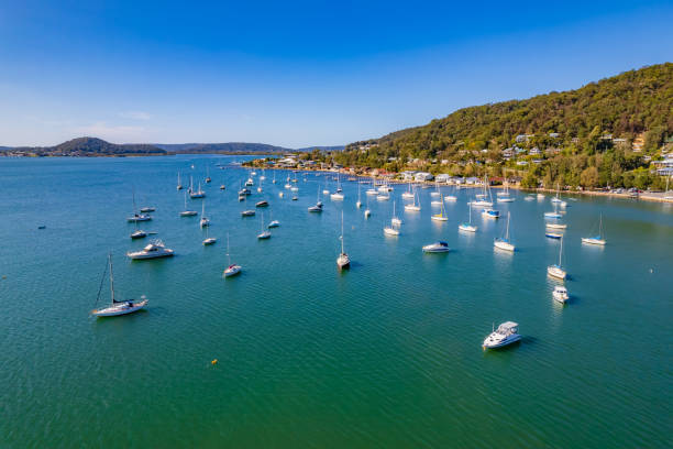 istock Aerial daytime waterscape with boats 1342987055