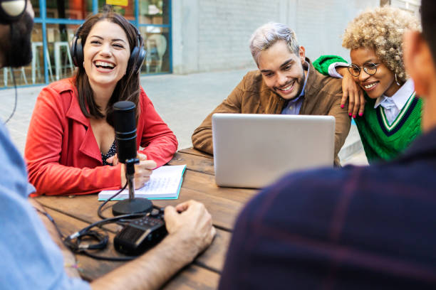 istock Multiracial young people working together and recording podcast online 1342987938