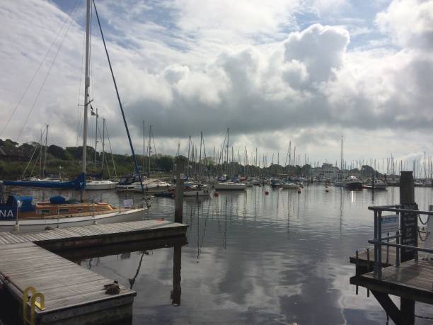 istock Lymington Quay pier with cloudscape, Hampshire 1342991763