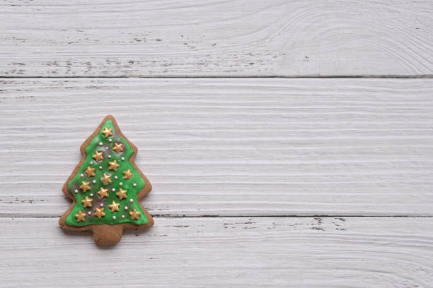 istock Gingerbread cookie of green Christmas tree 1343001478