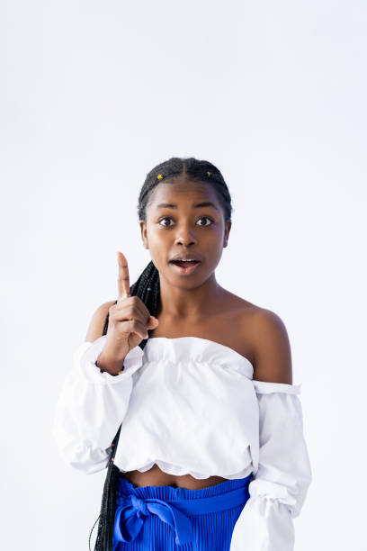 istock great idea attention gesture woman finger pointing 1343024351