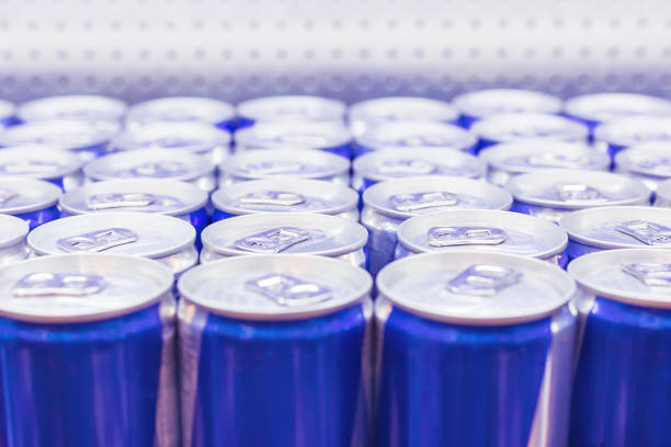 Cans with Energy drink in supermarket. Selective focus. Cans with Energy drink in supermarket. Selective focus. energy drink stock pictures, royalty-free photos & images