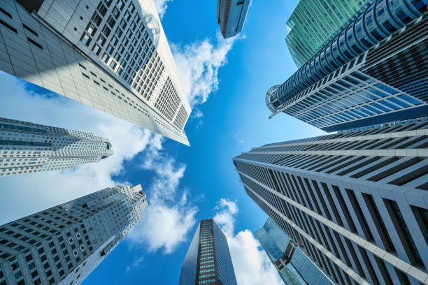 istock Singapore, city skyline looking up under skyscraper building business district 1343071792