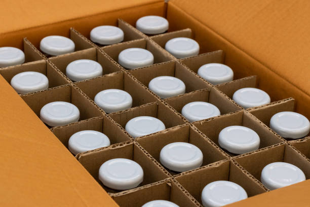 istock glass bottles in a cardboard box with partitions for transporting broken items. 1343077329