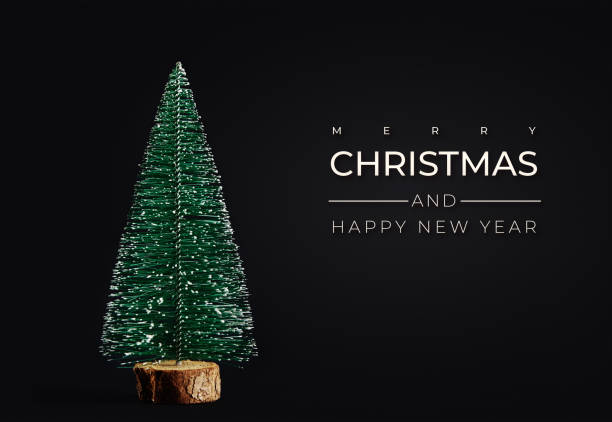istock Merry Christmas and Happy New Year composition with christmas tree on black background 1343083913