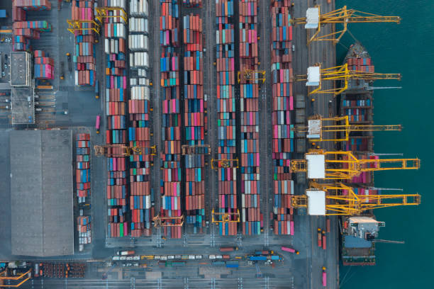 istock Aerial view container ship carrying container in import export business logistic and transportation of international by container ship in the open sea. 1343083980