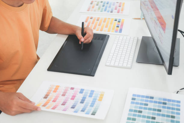 istock Young photographer and graphic designer at work in office. 1343084150