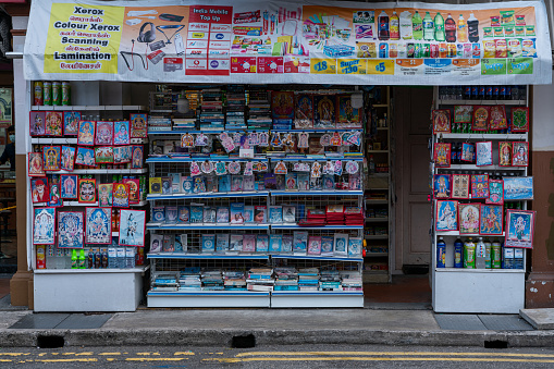 Singapore - July, 23 2021: An outdoors display of a shop with magazines, papers, and goods