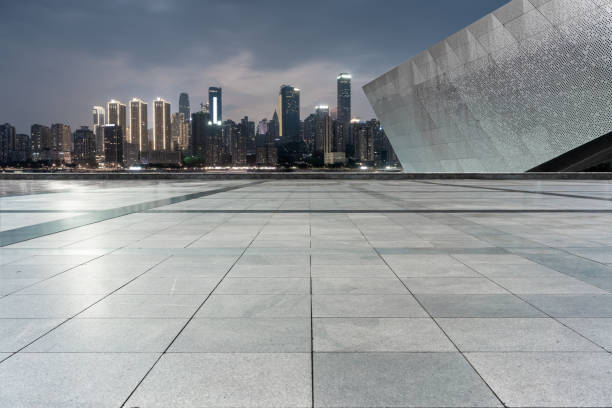 istock empty ground floor with modern cityscape at night. 1343096129