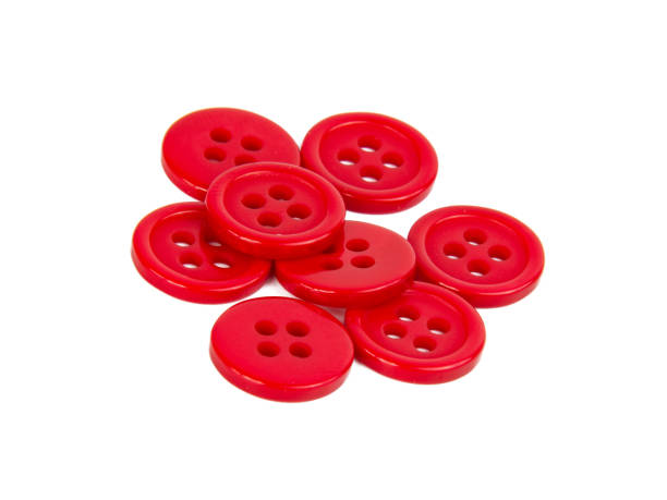 istock Red bright cloth buttons isolated on the white background 1343096486