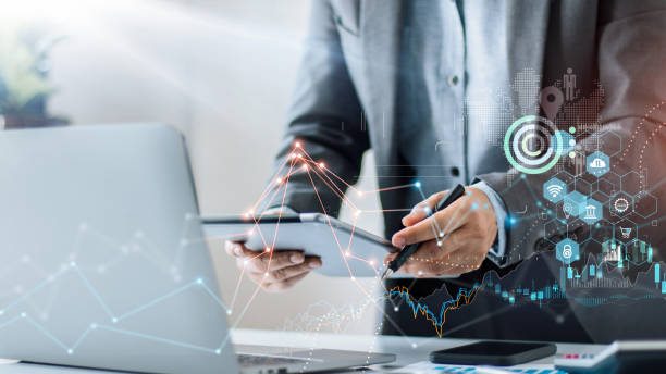 istock Businessman using tablet on global network connection on investor and customer with sale data exchange and development of business and economic growth graph. Marketing. Financial and banking. 1343100045