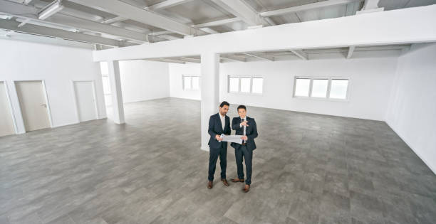 istock Business people discussing blueprint 1343100802