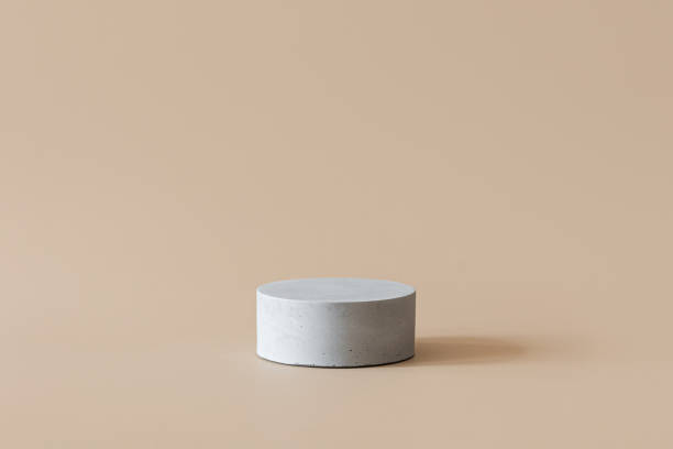 istock Abstract beige background with minimal podium scene with gray geometric forms. Stands and arch to show cosmetic products 1343101389