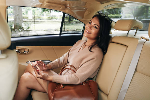 istock Happy Elegant Woman In Car 1343105365