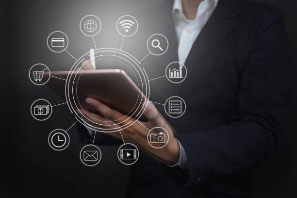 istock Hand holding tablet payments online shopping with graphic icon 1343118093