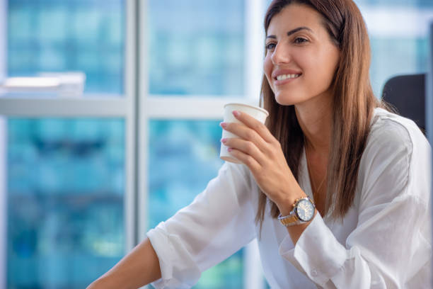 istock Businesswoman having fun on a coffee break 1343122263