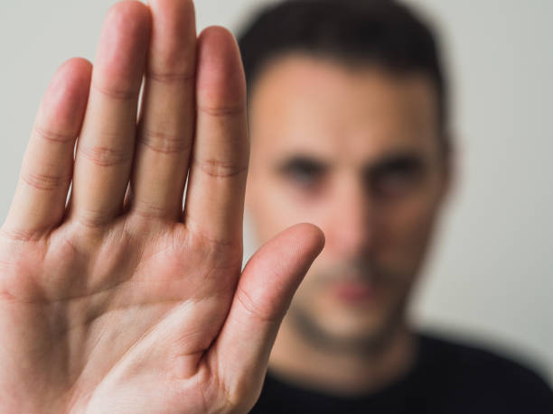 istock Defocused man saying stop with hand 1343123917