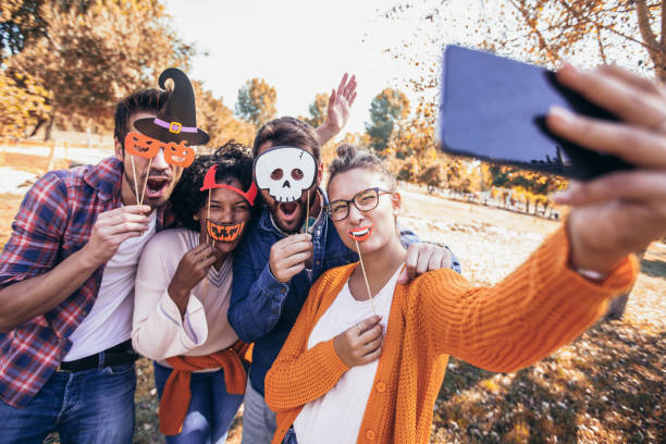 Group of young people hangout in the park. stock photo