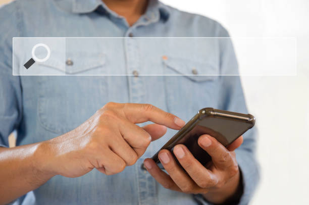 istock Young man using mobile smartphone to searching for information, Searching browsing internet data concepts 1343147599
