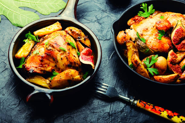 istock Chicken baked with potatoes and figs 1343152968