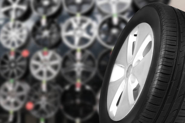 istock Black car tire in auto store, closeup 1343158566
