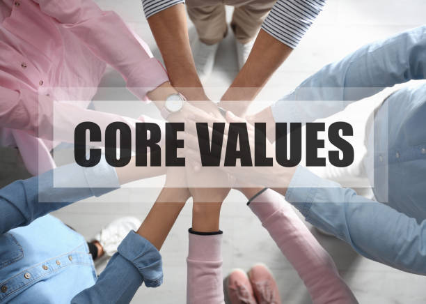 istock Core values concept. People holding hands together, top view 1343159327