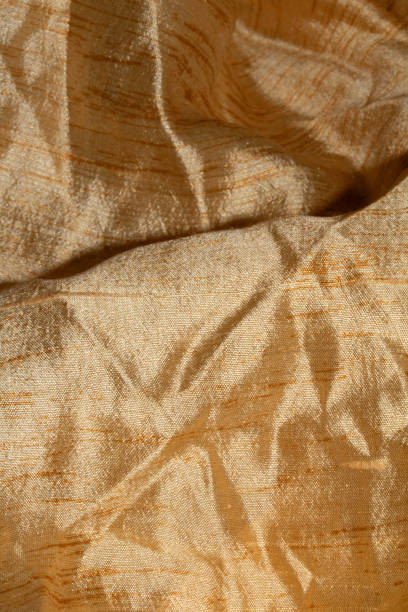 istock A Golden Copper Fabric Shiny Background 1343166114