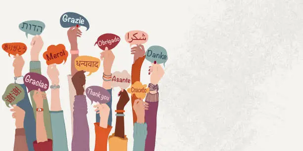 Vector illustration of Raised arms and hands of multi-ethnic people from different nations and continents holding speech bubbles with text -thank you- in various different languages. Banner copy space. Equality