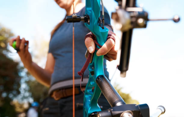 istock Cropped shot of an unrecognizable female archer practicing her craft out on the archery range 1343188717