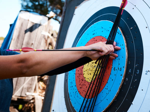 istock Cropped shot of an unrecognizable female archer practicing her craft out on the archery range 1343189038