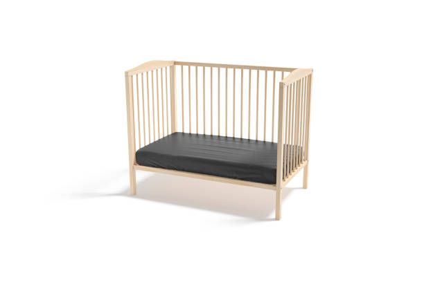 istock Blank wood cot with black crib sheet mockup, half-turned view 1343189800