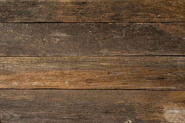 istock Wooden background, rustic, old larch boards, curved boards with burrs and cracks 1343190182