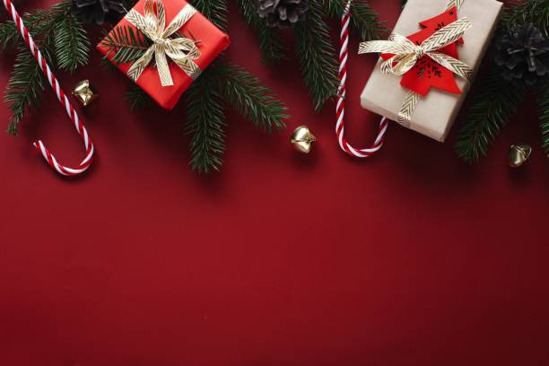 istock Beautiful Christmas greeting card template on red background 1343193518