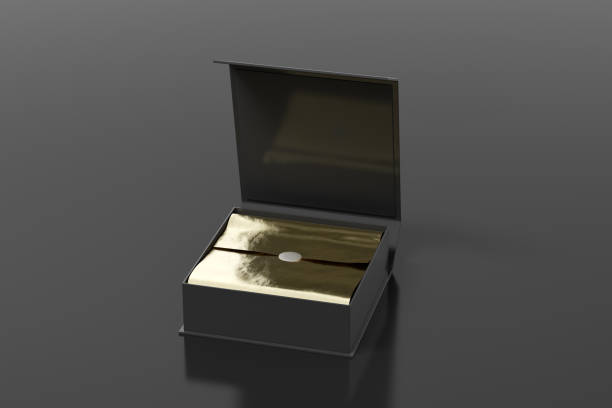 istock Black opened square folding gift box mock up with gold wrapping paper on black background. Side view. 1343197818