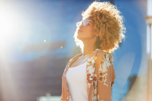 istock Happy young woman taking a breath 1343198297