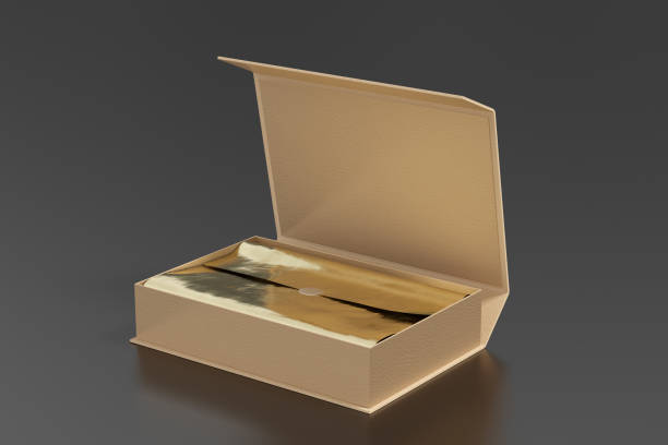 istock Leather opened rectangle folding gift box mock up with gold wrapping paper on black background. Side view. 1343198664