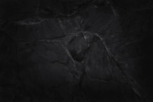 istock Dark grey black slate texture in natural pattern with high resolution for background and design art work. Black stone wall. 1343198953