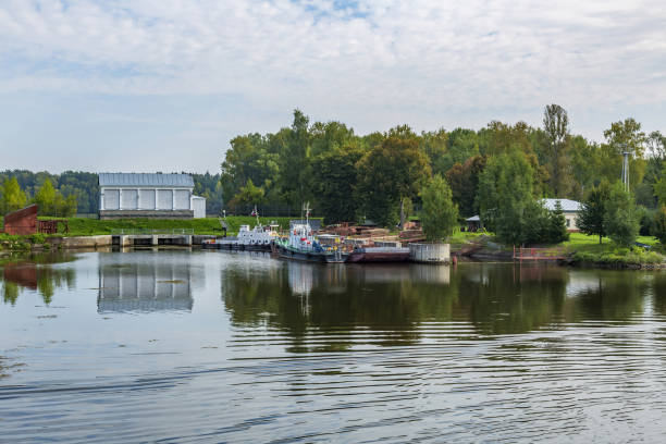 istock Old pier for small boats on the river bank 1343200074