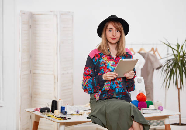 istock Hipster dressmaker with digital tablet 1343202309