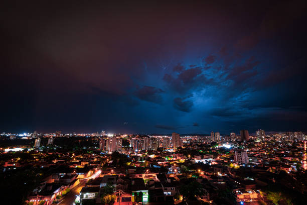 Lightning Storm Over Ribeirao Preto City in Brazil. Thunder blue light on a summer night concept image. Lightning Storm Over Ribeirao Preto City in Brazil. Thunder blue light on a summer night. ribeirão preto stock pictures, royalty-free photos & images