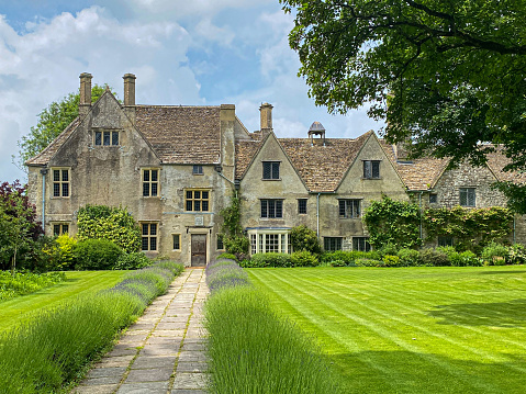 Avebury, Wiltshire, UK: July, 1st, 2021: Avebury Manor & Garden is a substantial property consisting of a Grade I listed 16th century manor house and its surrounding garden.