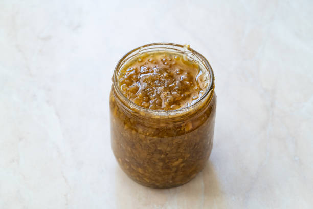istock Artichoke Jam, Marmalade with Fried Jerusalem in Glass Jar. 1343209491