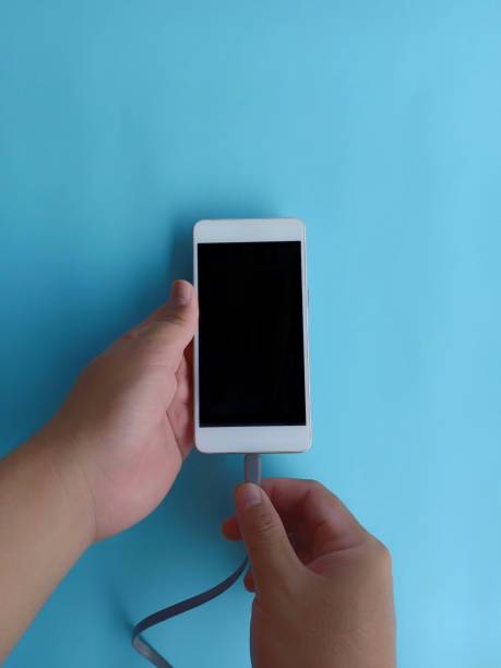 istock The hand that is plugging in phone charger 1343212236