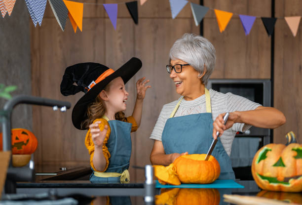 istock family preparing for Halloween 1343213814
