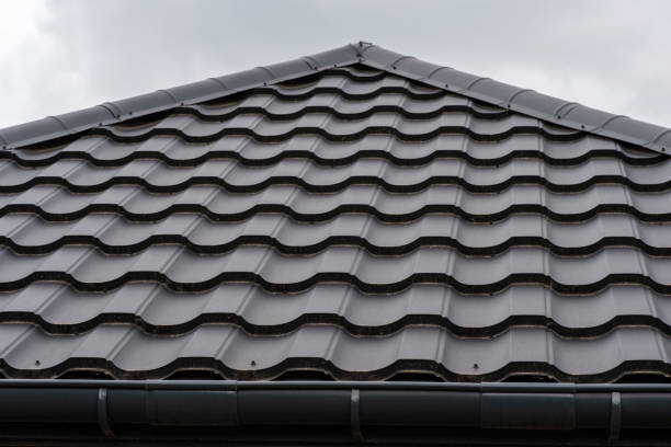 istock Dark brown metal roofing shingles 1343218825