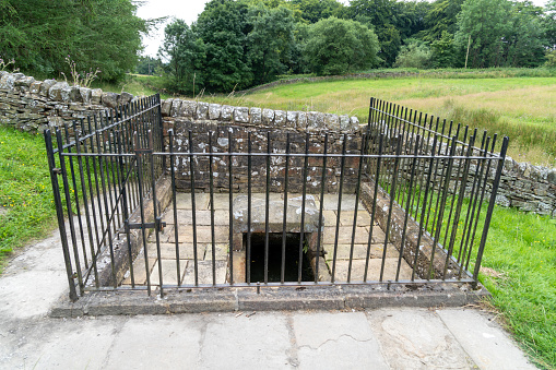 Mompessons Well in the great plague village of Eyam in Debyshire, UK
